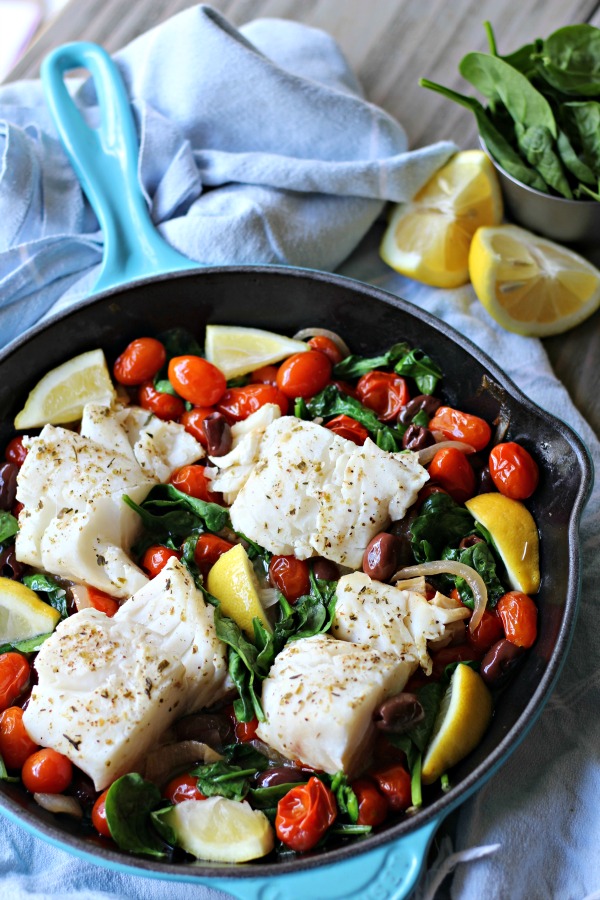This Easy Greek Fish Skillet recipe has restaurant worthy flavor yet is simple enough to make on a busy weeknight! It's a one pan, healthy meal that's Keto, Paleo, Whole30 and Gluten Free.