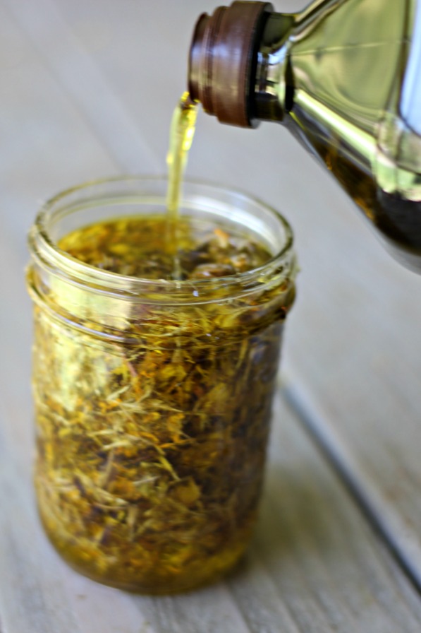 Learn how to make a homemade Arnica Oil for rapid relief of bruises, swelling, pain and muscle soreness. Arnica is one of the top effective and natural first aid remedies!